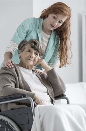 Support worker laughing with NDIS participant